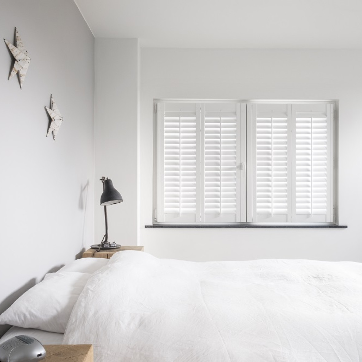 witte shutters slaapkamer